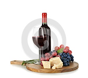 Red wine, cheese and ripe grapes on white background