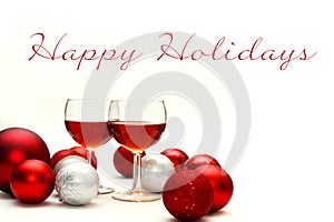 Red Wine and Christmas Decorations with Words Happy Holidays