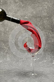 Red Wine From Cloth Pouring Into A Glass From Bottle
