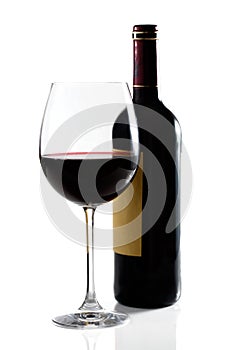 Red wine glass and bottle