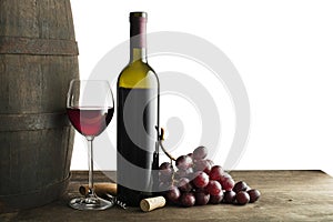 Red wine bottle and glass isolated on white