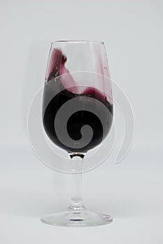 Red wine in glass cup. Tempranillo grape variety and Cabernet sauvignon. Wine made in Spain photo