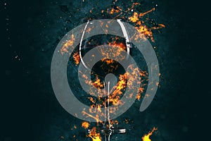 Red wine glass in fire
