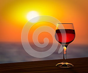 Red wine glass at the sunset