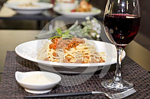 Red wine glasses with Spaghetti dessert