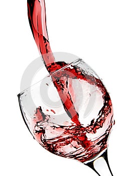Red wine pour into glass photo