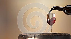 Red wine poured from a bottle into a wine glass. 3D rendering