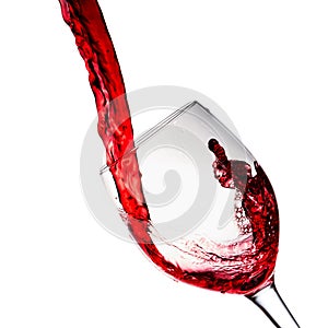 Red wine poured into wine glass