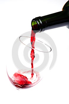 Red wine pouring close-up