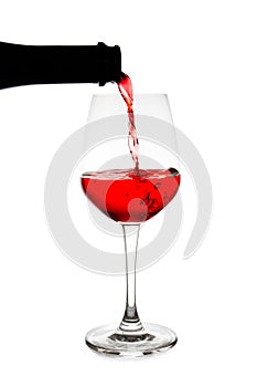 Red wine pouring isolated