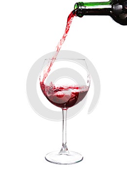 Red wine pouring on white background