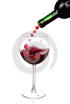 Red wine pouring on white background