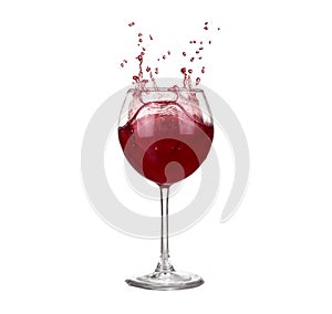 red wine pouring into wine glass isolated