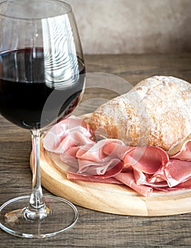 Red wine with prosciutto and ciabatta