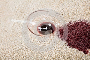 Red Wine Spilled From Glass On Carpet