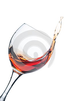 Red wine splash on white background