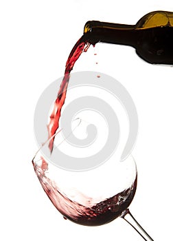 Red wine splash on a glass