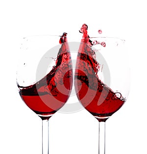 Red wine splash in two glasses