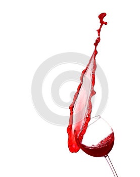 Red wine splashing from glass, isolated