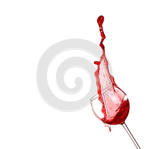 Red wine splashing from glass, isolated