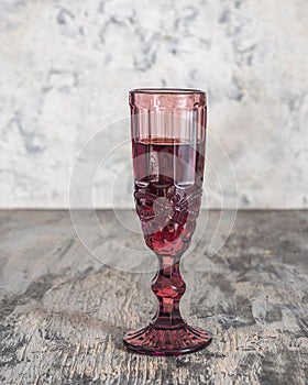 Red wine in a tall glass pink grocery