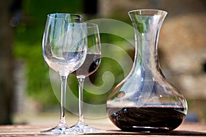 Red wine in a wine carafe and a two wine glasses