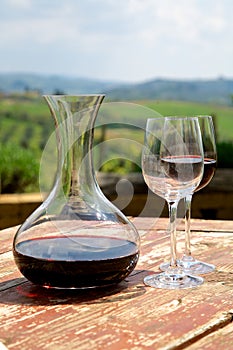 Red wine in a wine carafe and a two wine glasses