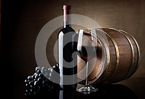 Red wine and wooden barrel