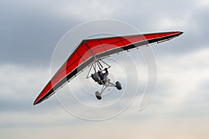 Red wing hang glider trike