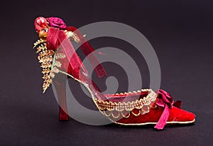 Red women`s high-heeled shoes