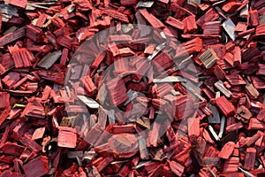 Red wood chips as mulch as background