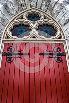 Red Wood Door in Arched entrance to a 19th Century Church