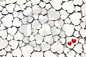 Red wood hearts on hearts background, valentine day concept.