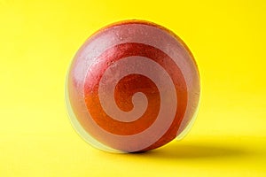 Red Wooden Ball Toy, on yellow Background