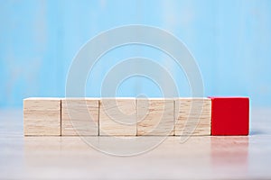 Red wooden block on the building. Business planning, Risk Management, Solution, strategy, different and Unique Concepts