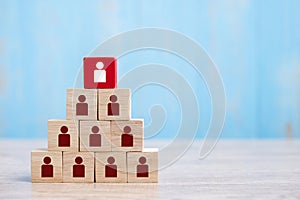 Red wooden block with white person icon on the building. People, Business, Human resource management, Recruitment, Teamwork,