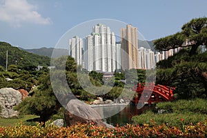 Red wooden bridge in Nan Lian garden in Hong Kong