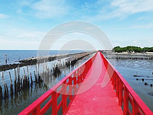 red wooden bridge near Matchanu Shrine,Samut Sakhon,Thailand.