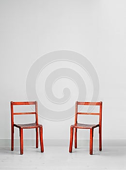 Red wooden chairs