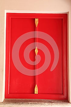 Red wooden door in temple,Wat Pho, Thailand