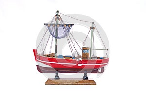Red wooden fishing boat, modelo escala photo