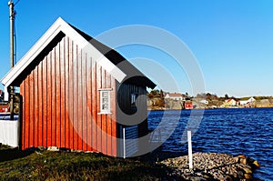 Red wooden garage for boat
