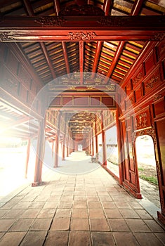 Red wooden hall of Hue citadel in Vietnam, Asia.