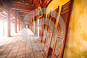 Red wooden hall of Hue citadel in Vietnam, Asia.