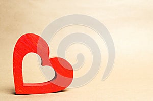 Red wooden heart, isolate, the concept of love, romance, feelings, valentine`s day, organ donors, blood transfusion, charity. pla