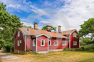 Red wooden house on the island Ã–land in Sweden