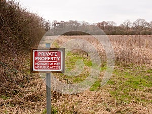 red wooden private property sign farm land no right of way no pu