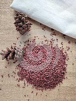 red yeast rice or red fermented rice or red kojic rice, Angkak in Indonesian.  herbs and spices in cooking