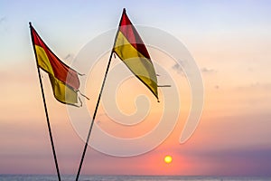 Red & yellow beach safety flags