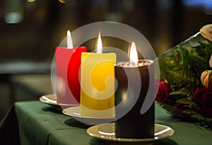 Red, yellow and black candles composing belgian flag at Belgium embassy in Madrid, Spain